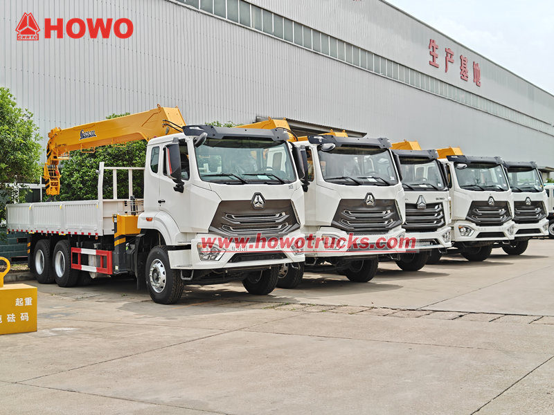 8 units HOWO NX 6x4 truck with 12 Ton crane lift are export to Tanzania